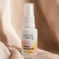 Bottle of Witchy Lashes Retinyl Renewal Oil on a beige fabric background